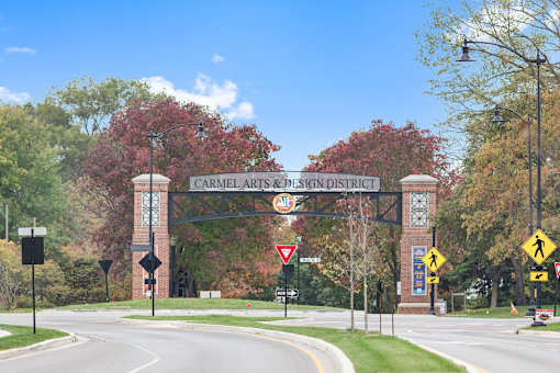 a sign for the central arts and science district on the side of a road at Gramercy Apartments, Carmel, IN 