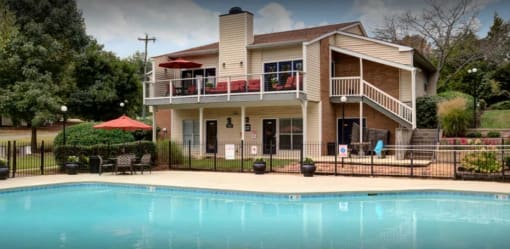 a large swimming pool in front of a house at Landmark at Lyncrest Reserve Apartments, Nashville, 37209