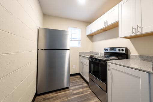 the preserve at ballantyne commons apartment kitchen with stainless steel appliances