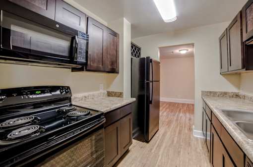Electric Range In Kitchen at The Plaza at Library Square, Indianapolis, IN, 46204
