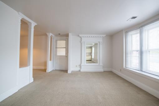 Living Room With Expansive Window at The Plaza at Library Square, Indiana
