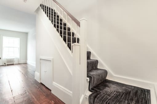 a view of the stairs from the front of the house