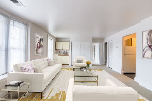 Seating in living room at The Plaza at Library Square Apartments, Indianapolis, IN