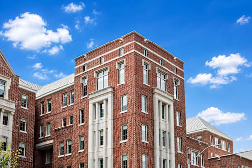 A red brick building with white trim and windows.