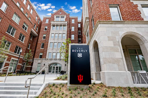 A brick building with a sign that says The Beverly.
