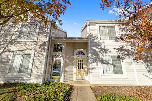 A resident entrance at The Winds at Poplar Creek Apartments , Schaumburg, IL