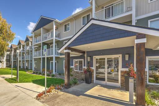 Exterior view of building with landscape at VINTAGE AT VANCOUVER, Vancouver, WA