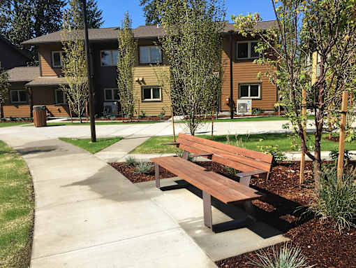A park with benches at Bridge Meadows Beaverton 55+, Beaverton, OR 97005