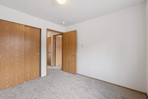 A room with two doors and a carpeted floor  at The Timbers by Vintage, Arlington, WA 98223