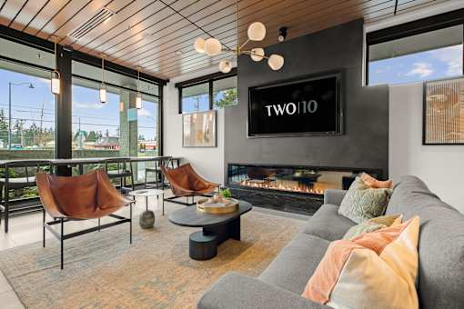 A living room with a fireplace at Two 10 by Vintage, Washington 98133