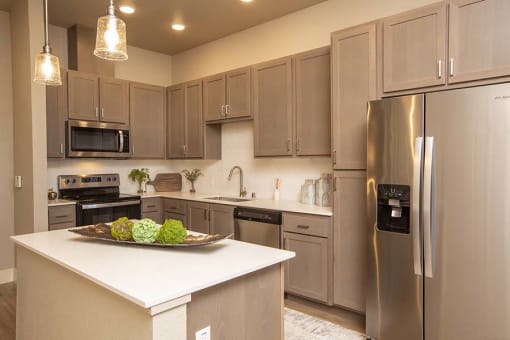 kitchen with island l Sacramento CA Apartment Rentals