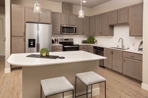 kitchen with island l Alira Apartments for rent in Sacramento Ca