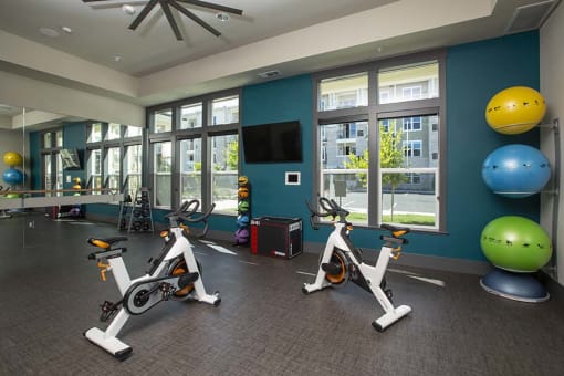 gym with fitness equipment l Alira Apartments for rent in Sacramento Ca