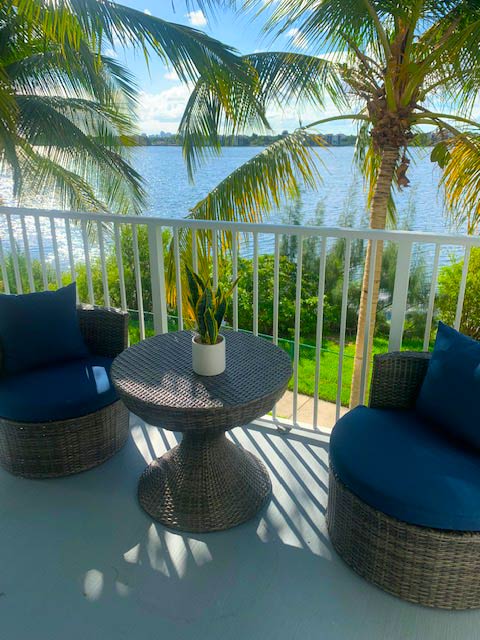 Chairs on a patio at Aqua 2800, Florida