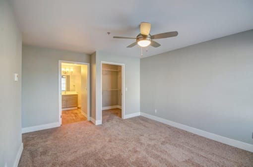 3 BR Apartments in Dupont, WA - Clock Tower Village - Spacious Bedroom with Ceiling Fan, and Attached Bathroom