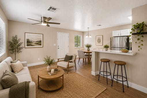 Open concept living room and dining area at Dash Apartments, Las Vegas, 89104