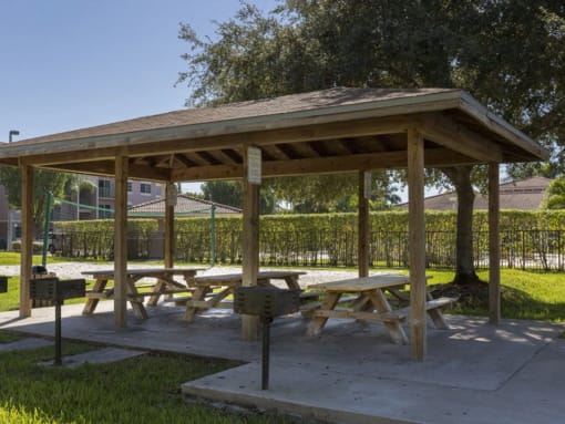 Covered seating by BBQ area at Doral Terrace, Doral
