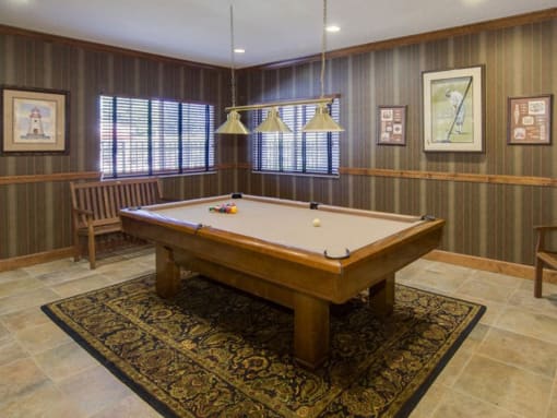 Pool table in center of room at Doral Terrace, Doral, FL, 33178