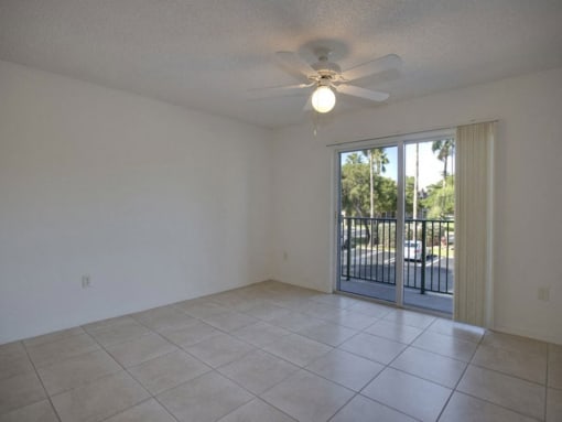 Living room with patio door at Doral Terrace, Doral, FL