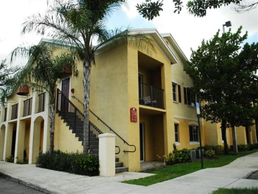 Exterior of building with grass at Alhambra Cove, Miami Florida