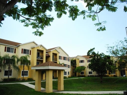 Exterior of building with grass at Alhambra Cove, Miami, Florida