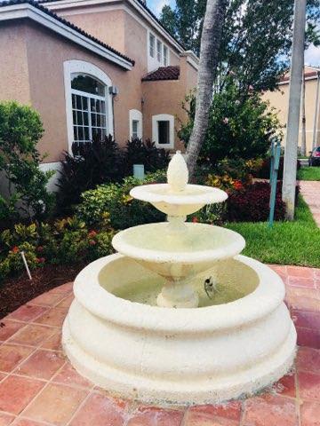Water feature by office Golden Lakes Apartments Miami Florida