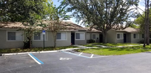 Parking near buildings at Grove Pointe, Ruskin, 33570