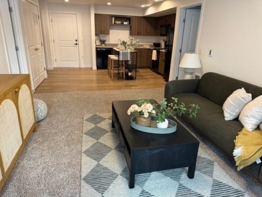 a living room with a couch and a coffee table at FARM BY VINTAGE, MILL CREEK
