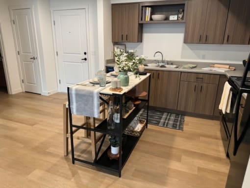 a kitchen with a table in the middle of it at FARM BY VINTAGE, Washington, 98012?