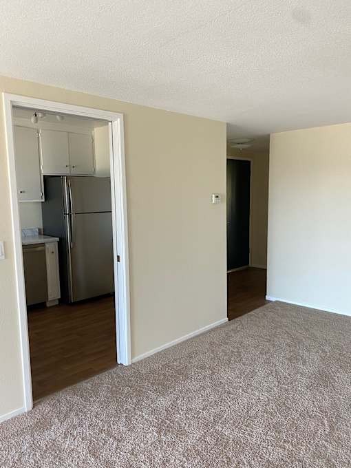 A white cabinet with a drawer is open.at Via Casitas, Greenbrae, 94904