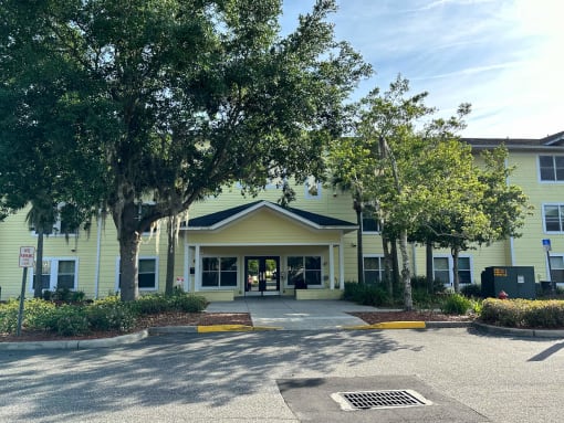a large building with trees in front of it at SUMMERBREEZE & SUMMERSET, ST. AUGUSTINE, 32086