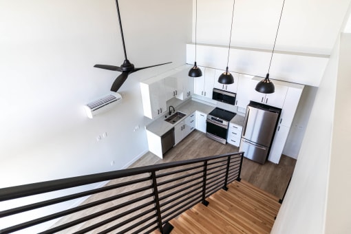 an overhead view of a kitchen with a stainless steel refrigerator at Luella, Sacramento, CA