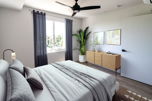 a bedroom with a bed and a ceiling fan at Luella, California