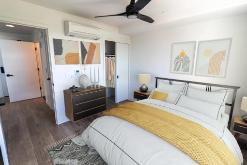 a bedroom with a bed and a ceiling fan at Luella, Sacramento, CA