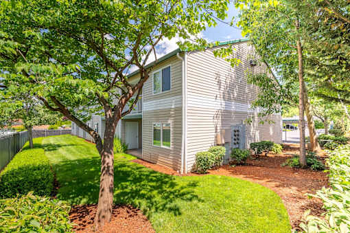 A house with a tree in front of it.at Vancouver Mall Apartments, Vancouver, 98662 ? 