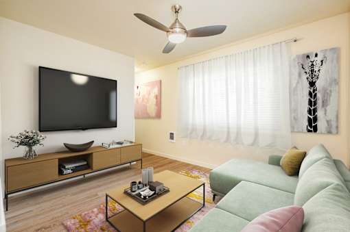 Living Room With TV at Fairview Village Homes, Oregon