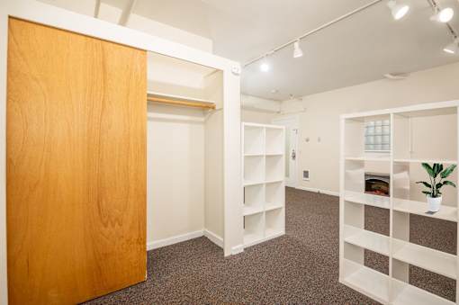 A room with a wooden door and shelves.at Palladian Apartments, Portland, OR 97201 ? 