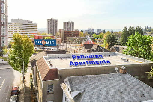 A view of a cityscape with a building named Palladian Apartments in the foreground.at Palladian Apartments, Oregon, 97201?