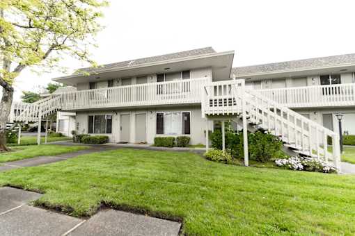 Exterior building with grass and stairs at OTAVON APARTMENTS, Novato