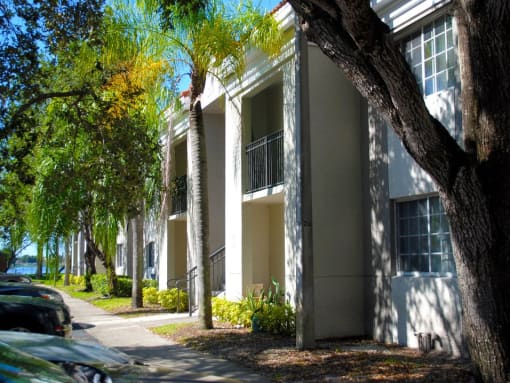 Exterior building with sidewalk Heron Pointe Apartments Miramar Florida