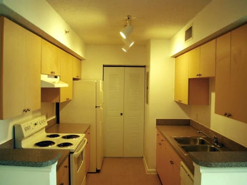 Kitchen with appliances  at Bay Winds, Florida