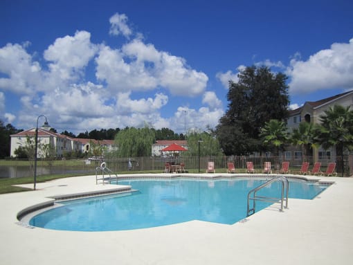 Mission  Pointe apartments resort style pool with lounge chairs at Mission Pointe Apartments, Florida, 32218