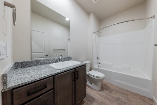 apartment bathroom with tub sink and toilet at Springview by Vintage, Nevada, 89512