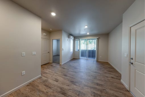 the spacious living room and dining room in a new home at Springview by Vintage, 89512