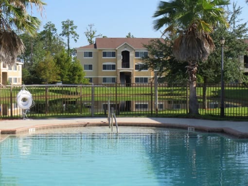Swimming Pool area at Carolina Club Apartments, Daytona Beach, Florida