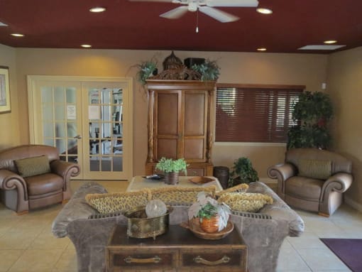 Clubhouse seating living area at Carolina Club Apartments, Daytona Beach