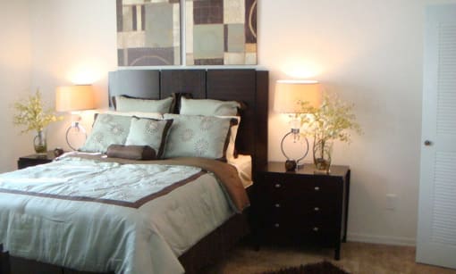 Furnished bedroom at Carolina Club Apartments, Daytona Beach, FL