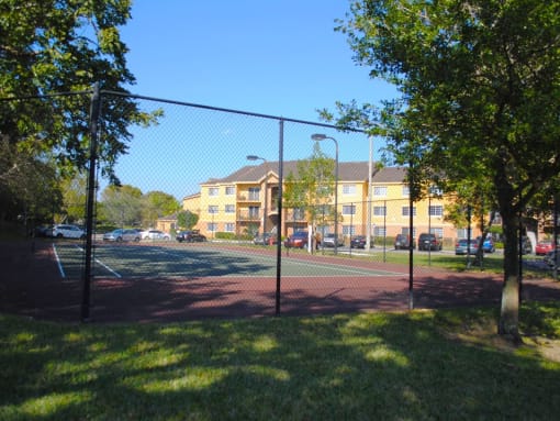 exterior and tennis court at Indian Trace, West Palm Beach, FL 33407