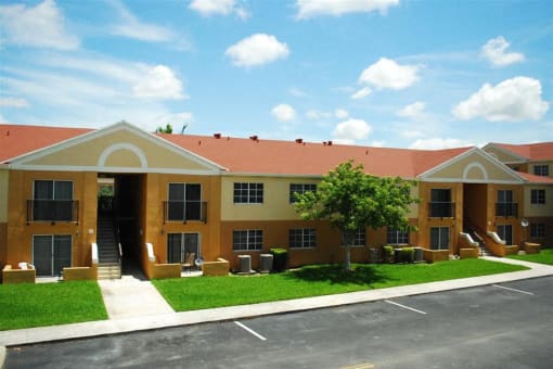 Marbrisa Apartments community exterior and parking area at Marbrisa Apartments, Miami Gardens, 33014