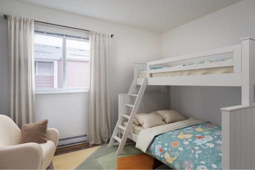 a bedroom with a bunk bed and a window at Fort Vancouver Terrace, Washington, 98661